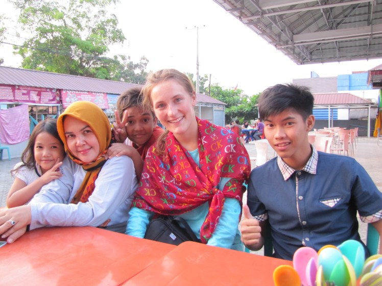 Me with Ibu Asro and family on a recent holiday. We went to a hot spring and then had dinner on the way home. The two little ones are hers and the guy next to me is another friend of her son. She's great, as is her family.