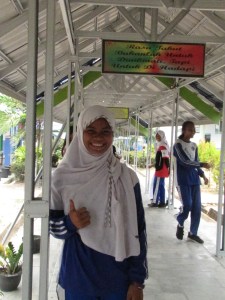 One of my students in the outdoor hallways of our school. She didn't need the banana song for encouragement that day.