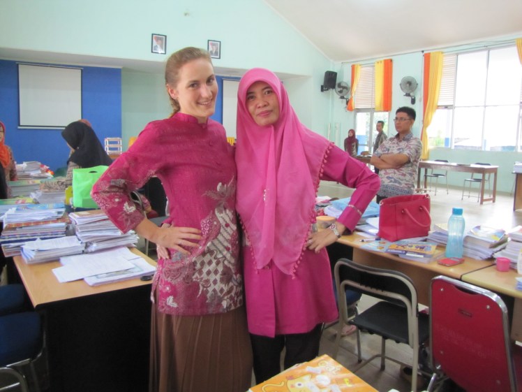 Me and Ibu Isnaini -- the ladies in pink. Our desks are of course next to each other in the teacher's office. And yes, we do often coordinate outfits. Despite the miscommunication that precipitated this post, we have a great personal relationship. 