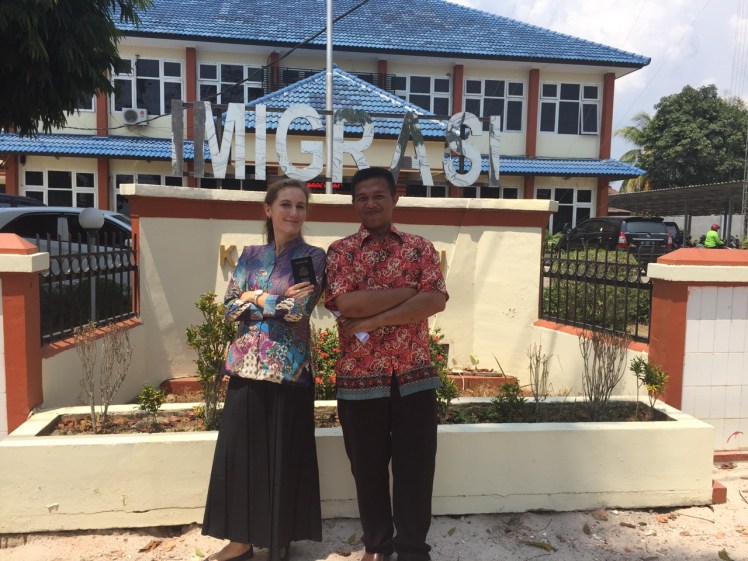 Pak Elvan and I strike a triumphant pose in front of my beloved Kantor Imigrasi.