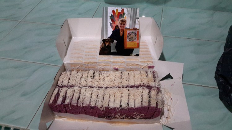 The kiddos went nuts for these brownies, but then again they are enthused about anything we feed them. It is purple because it is taro-flavored. The white stuff on top is shredded cheese. And the photo is my lovely mother posing with her dog and our family's Thanksgiving decorations. Love you mumzie!