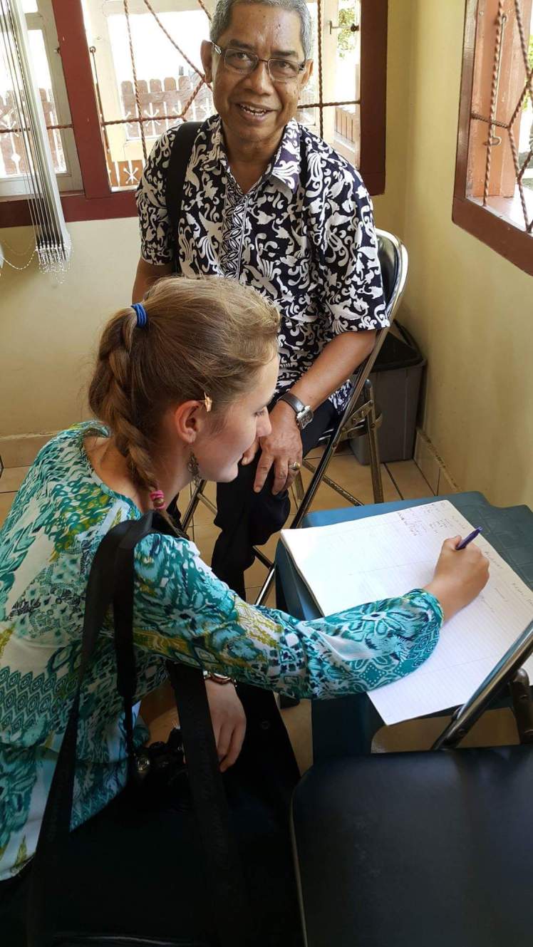 Signing the museum's guestbook before taking our leave.