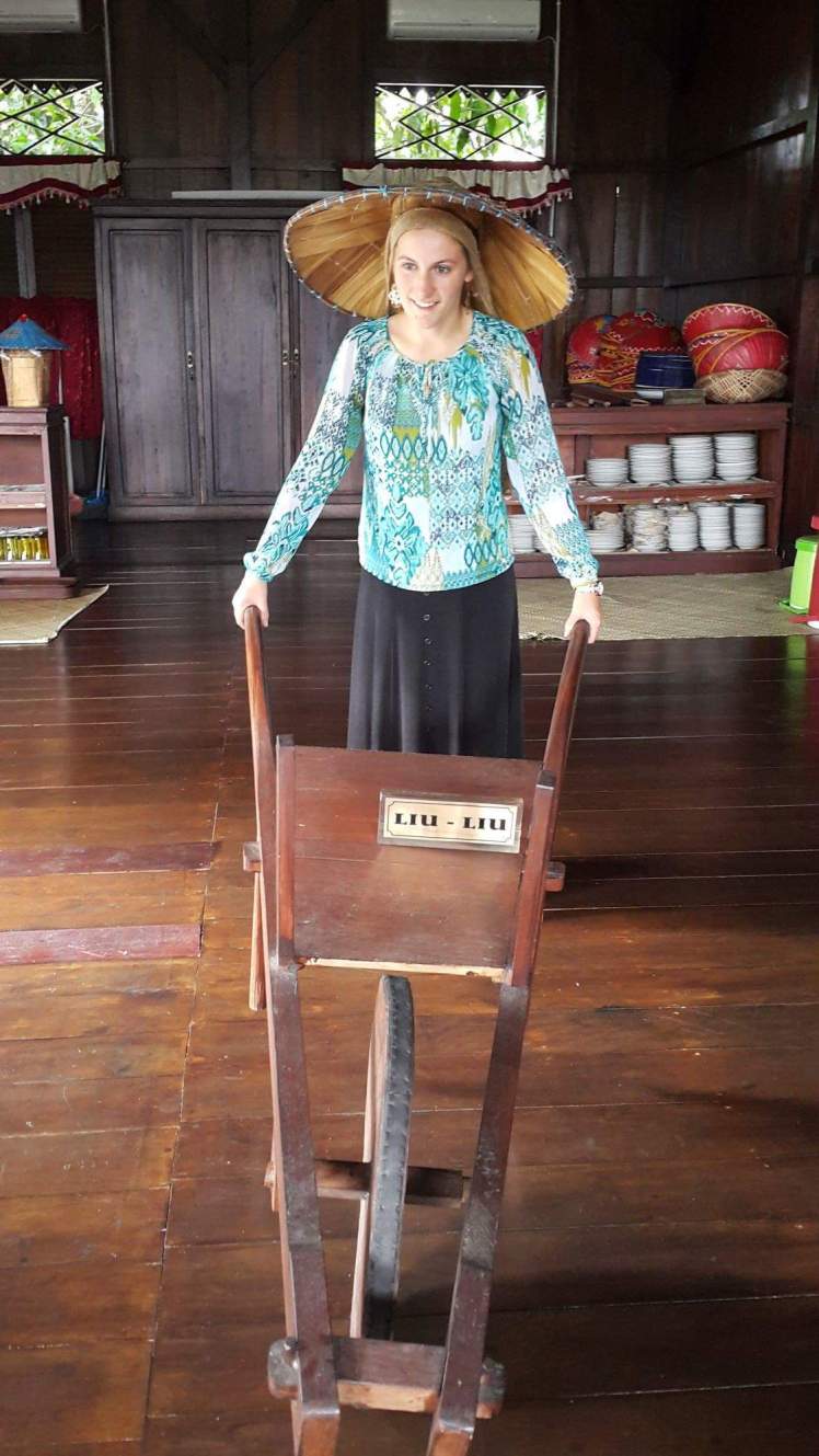 I try my hand at using a traditional wheelbarrel.