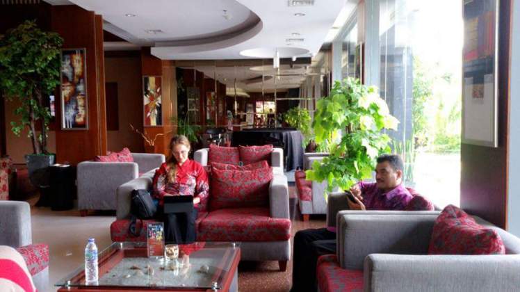 Getting some work done in the hotel lobby before we left for the airport.