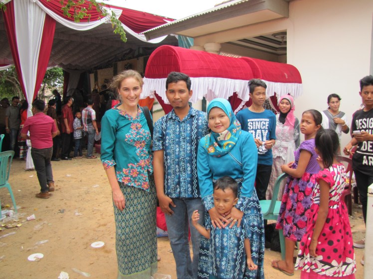 As I walked around taking pictures, I attracted quite a bit of attention. Everyone, from the hired help to families wearing matching batik, wanted to take photos with me. As a blonde-haired, blue-eyed foreigner here I am basically a walking photo-op.