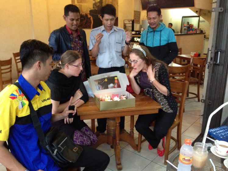 This last photo is from this afternoon at Kingkong Kopitiam, the coffeeshop where Caitlin and I have become regulars and bonded with a group of badminton players who enjoy a good joke and endless cups of coffee. We brought the cupcakes (remnants from the party) and shared with our friends and the staff of Kingkong.