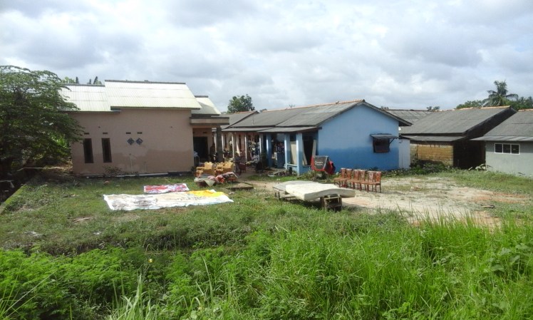 Some houses next to the canals that we passed on our way back to school. People's stuff is still strewn about all over town. It has not rained the past few days, so things are finally starting to dry, although mold is a big problem now (including in our house). You can also see the water line on the house that shows how high the water was.