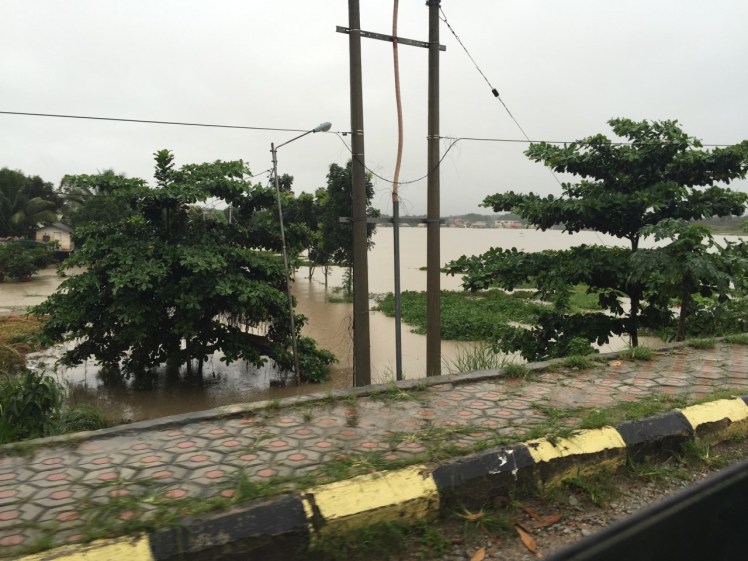 A view from the bridge on the way back home from school. One of my friend's houses is submerged behind the tree on the left. What's more is this lake/river became nothing but cracked mud during the peak of the dry season. It must be hard to plan infrastructure with dramatic weather changes like this.