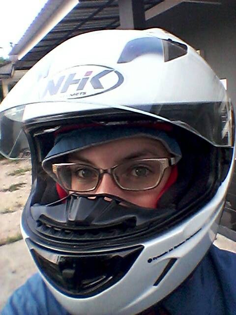 The full-face helmet and jacket that I always wear when I ride Sally.